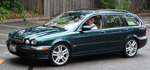 Ягуар x-type. ягуар прыгнул