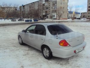 Рено logan, kia spectra. машины времени